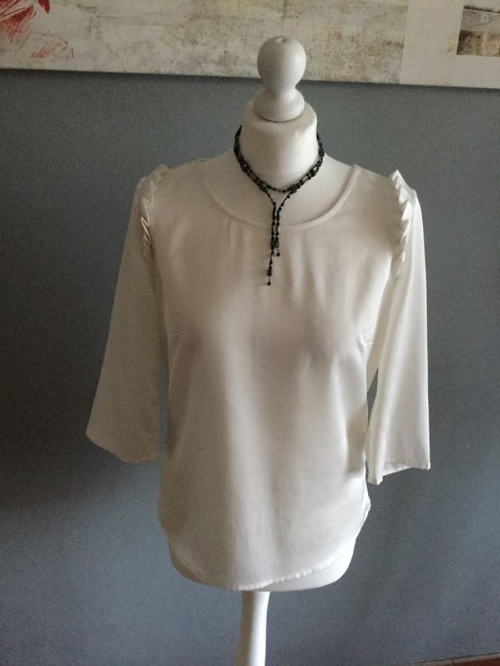 Blouse très féminine