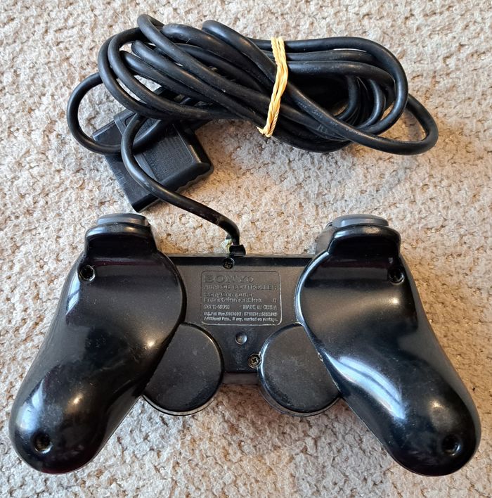 🎮 Manette officielle DualShock 2 noire Sony PlayStation 2 PS2 - photo numéro 2