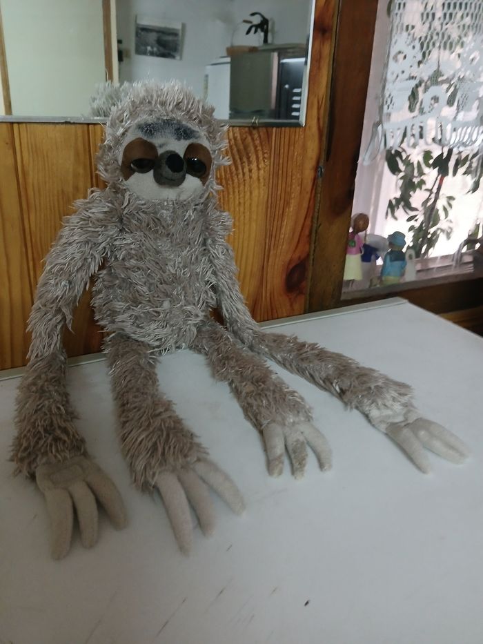 Peluche singes a longs bras