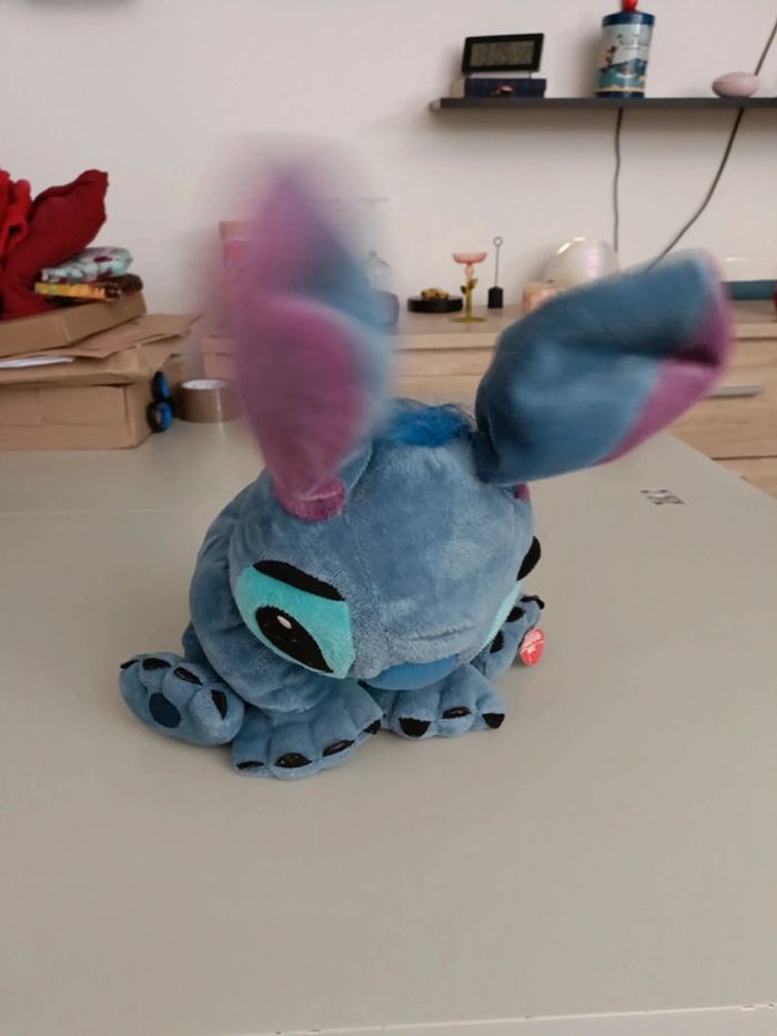 Peluche Stitch qui chante et danse. - photo numéro 7