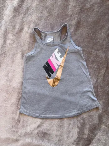 Débardeur Nike fille taille 12 mois gris en très bon état