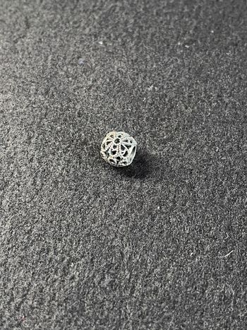 Pandora charm fleur ajouré
