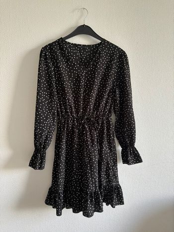 Robe noire à pois blanche