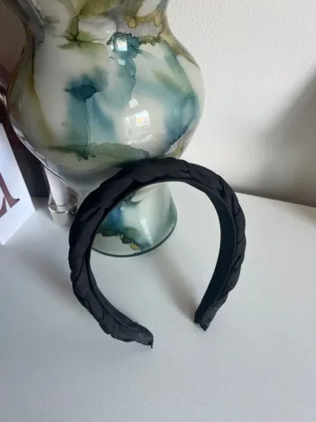 Serre tête noir tressé