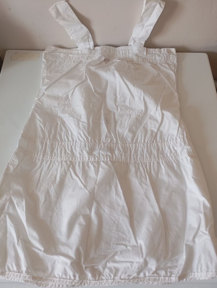 Robe coton blanc. 8 ans . Boutons pressions cœur. Larges bretelles. NKY.. Très bon état - photo numéro 5