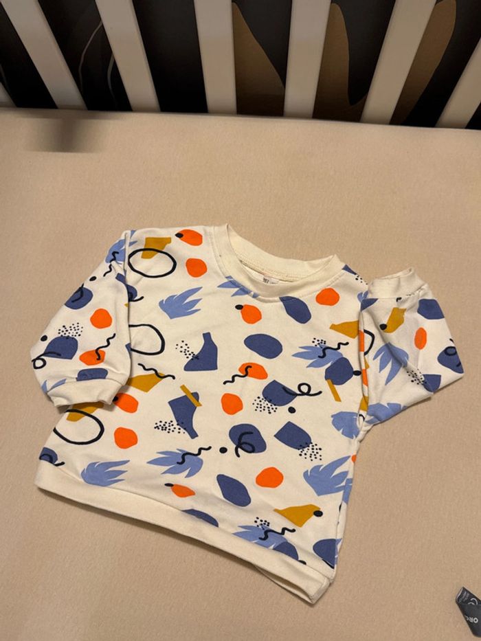 Comme neuf pull 9 mois