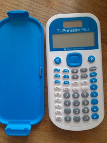 Calculatrice  Texas instrument primaire plus