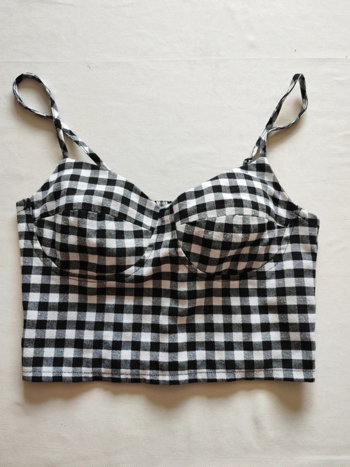 Petit haut à carreaux noir et blanc taille XS très bon état