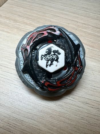 Toupie métal fusion rock zurafa wind & shoot beyblade