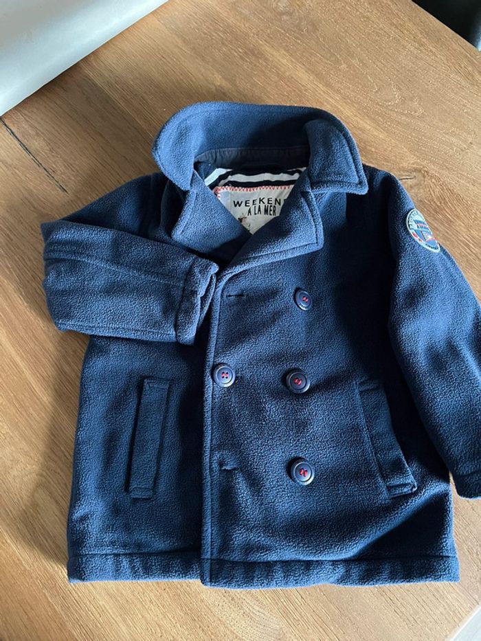 Manteau polaire week-end à la mer