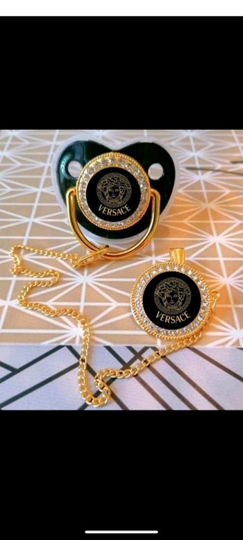 Tétine noir baby Versace