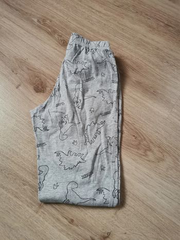 Pantalon bas de pyjama gris avec dinosaures