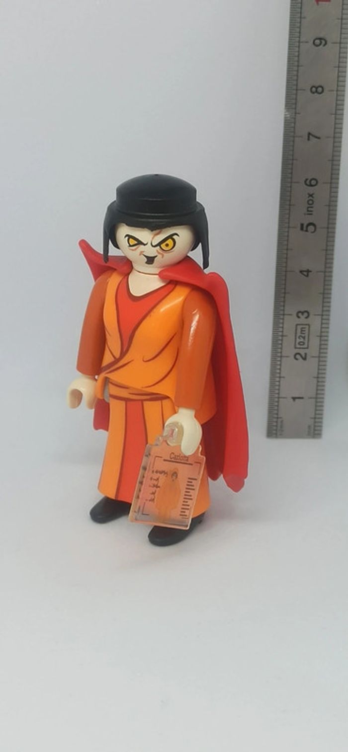 Une Femme sorcière orange avec 2 visages playmobil - photo numéro 2