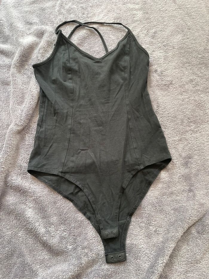 Body taille xs, avec bouton de pression