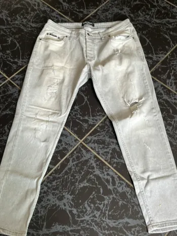 Jean gris troué slim L