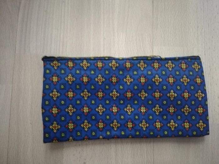 Très jolie trousse imper neuve vintage