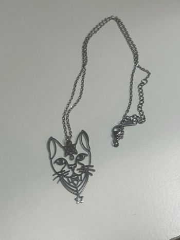 Chaîne + pendentif neufs