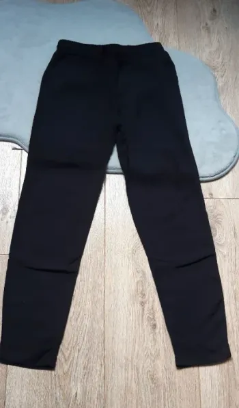 Pantalon fluide gémo noir 8 ans état neuf