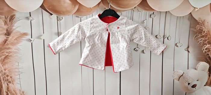 Gilet réversible Obaïbi 3 mois – Rouge & blanc à pois
Fille - photo numéro 2
