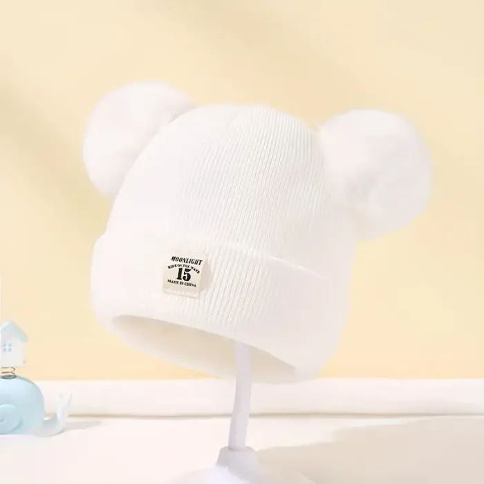 bonnet bebe blanc pompon