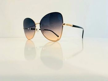 Lunette de soleil femme papillon dorée verres dégradés uvprotection catégorie 2