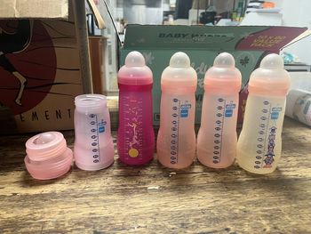Lot biberons rose MAM  