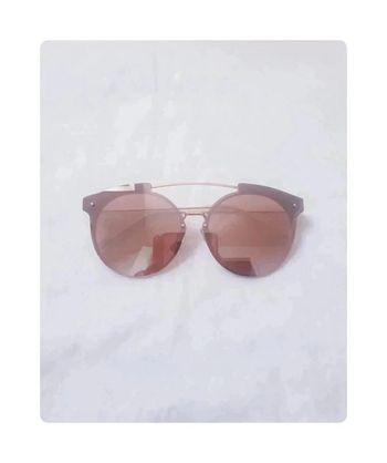 Magnifique paire de lunettes de soleil rose gold