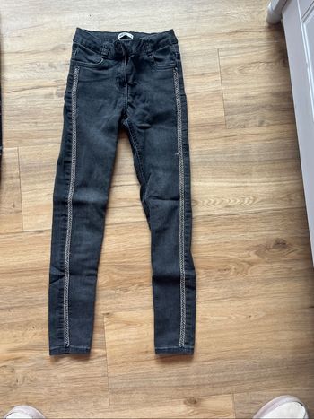Jeans noir avec strasse