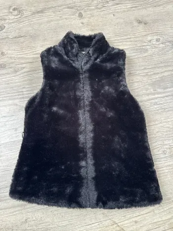 Veste toute douce sans manches noire orchestra 8ans TBE