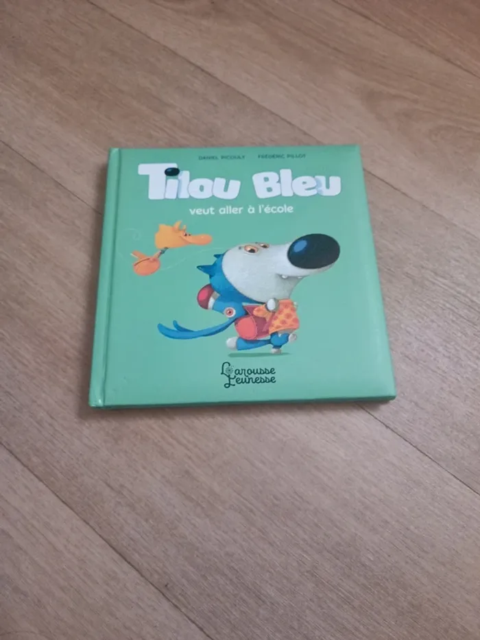 Tilou bleu veut aller à l'école