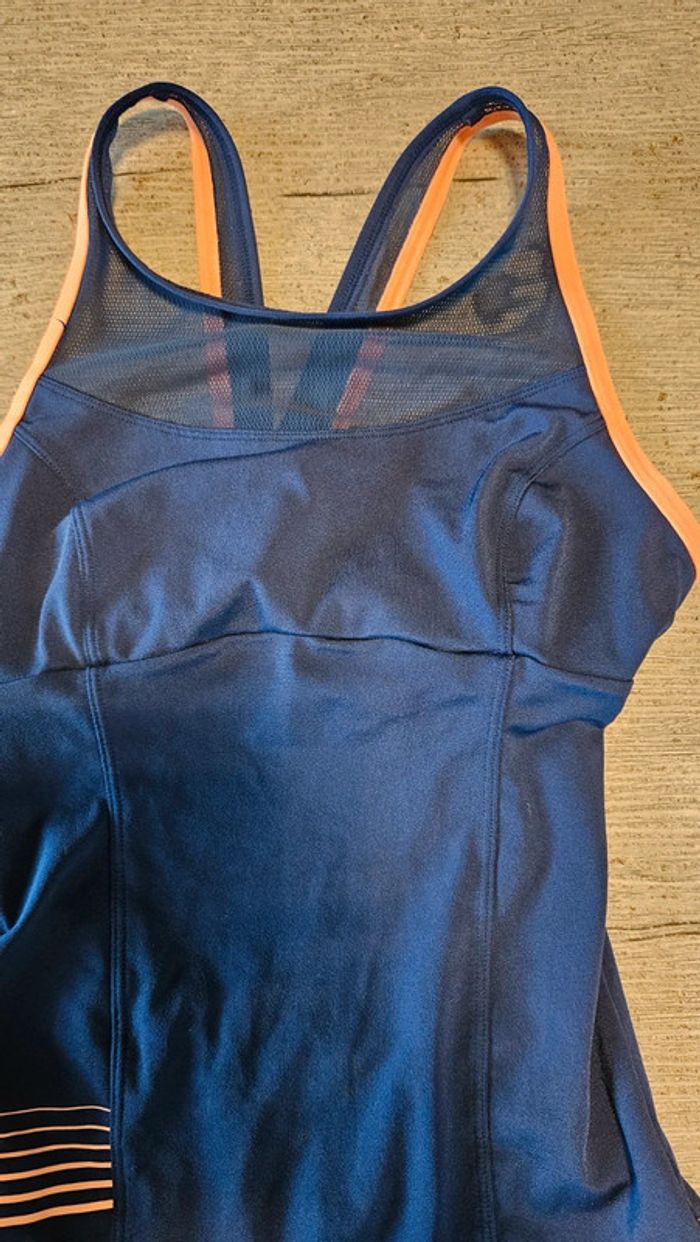 Maillot de bain 1 piéce femme bleu foncé, bord orangé, taille 38, peu mis - photo numéro 5