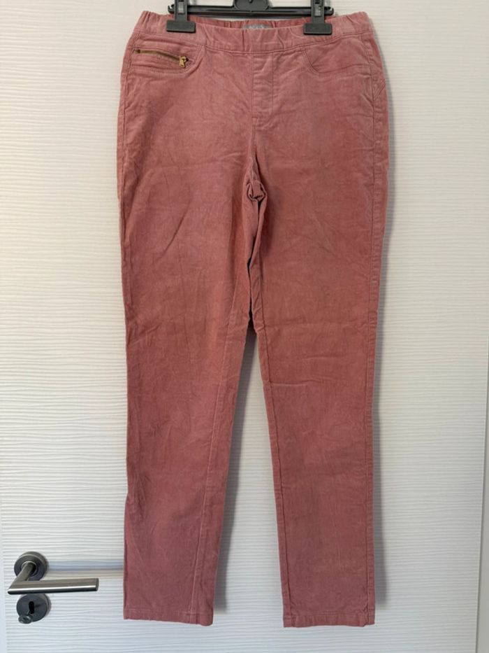 Pantalon en velours rose clair à fermeture éclairs sur les poches