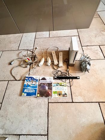Console Wii + wii Motion + jeux