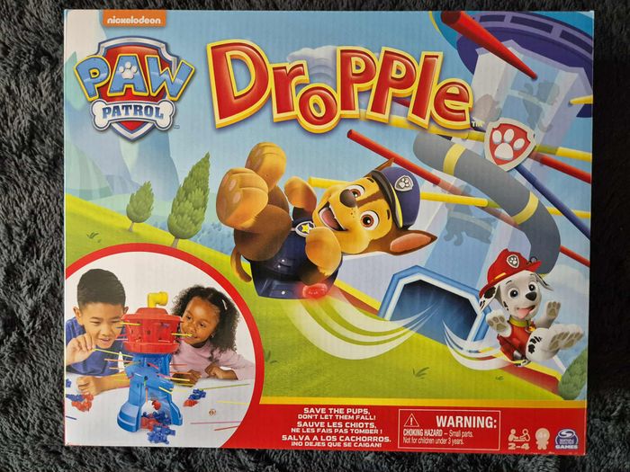 Paw Patrol - Pat Patrouille - Dropple Jeu de Société ouistiti  - Jeu D'Adresse avec Tour & Bâtonnets