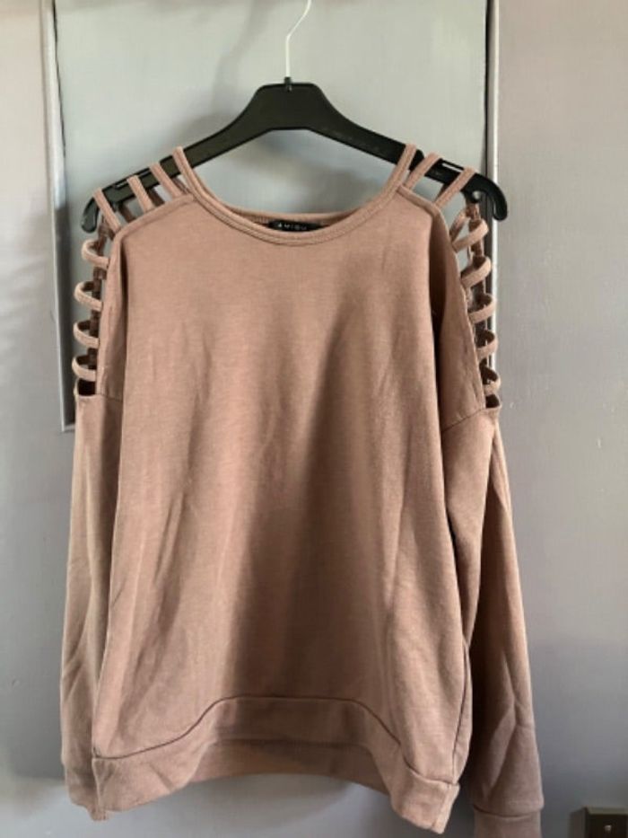 Pull manches découvertes
