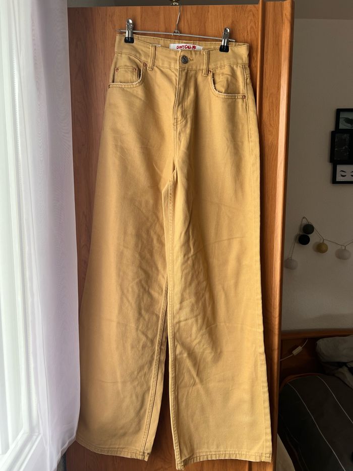 Jean jambes larges moutarde Jennyfer taille 34-XS