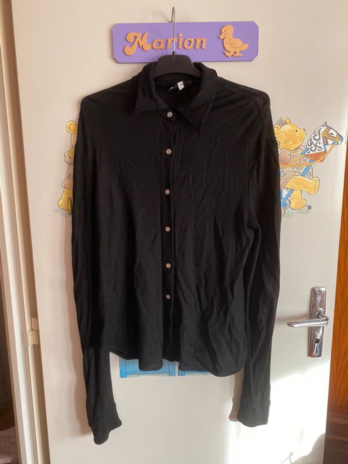 Chemisier noir, taille Xl.