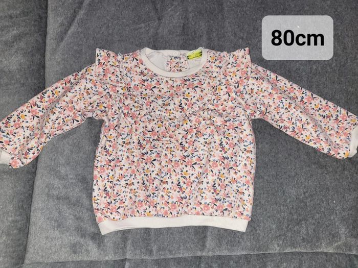Pull fleurs tape à l'œil