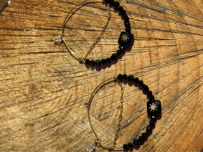 Créoles acier inoxydable or perles  noires multi facettes et carré étoile