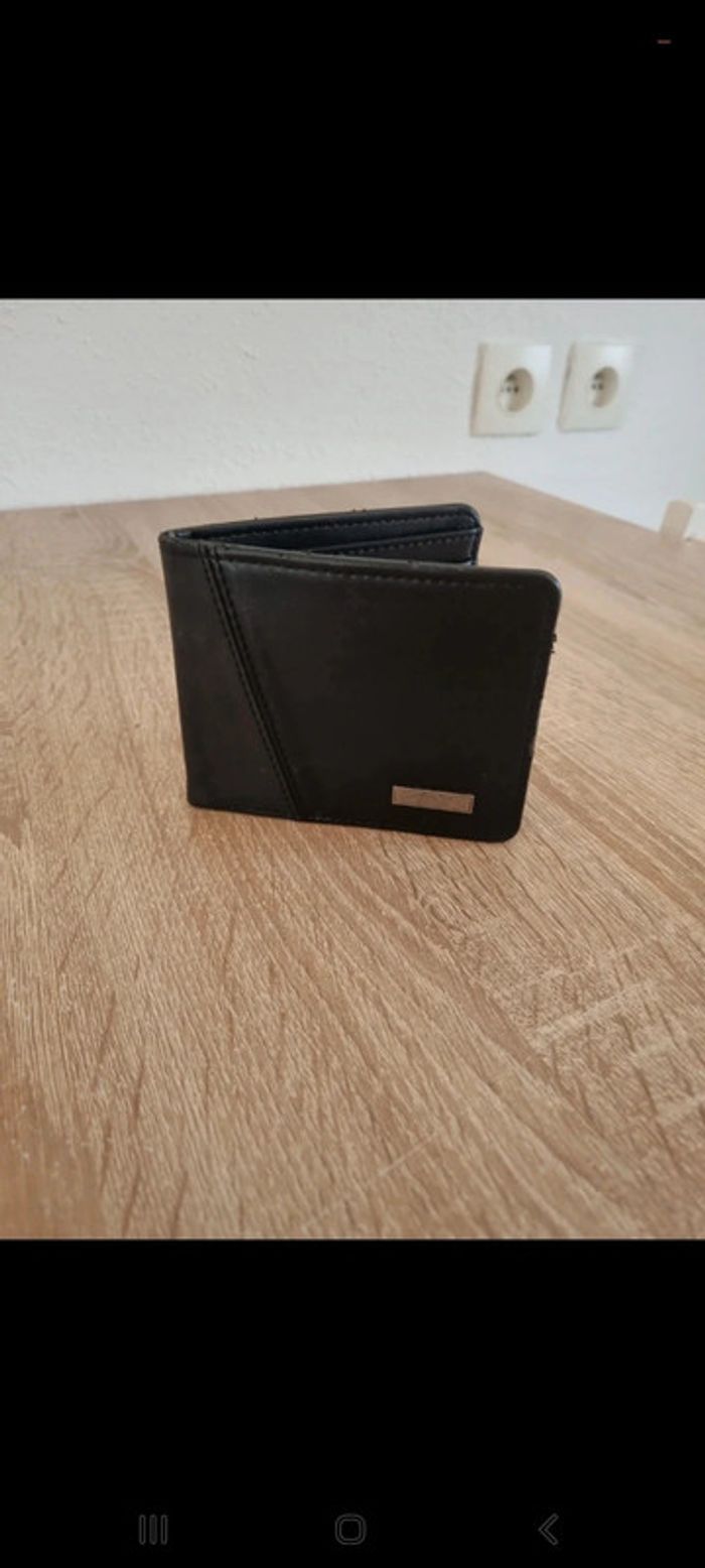 Portefeuille arrow