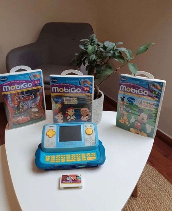Console Mobigo vtech bleu + 4 jeux en très bon état