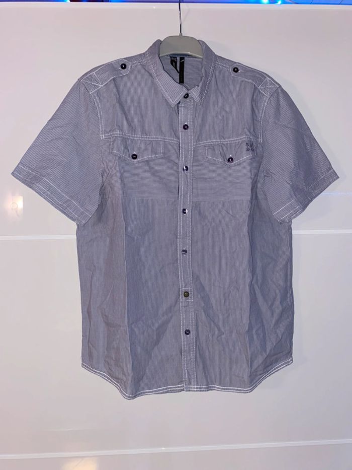 Chemise à manches courtes rayée