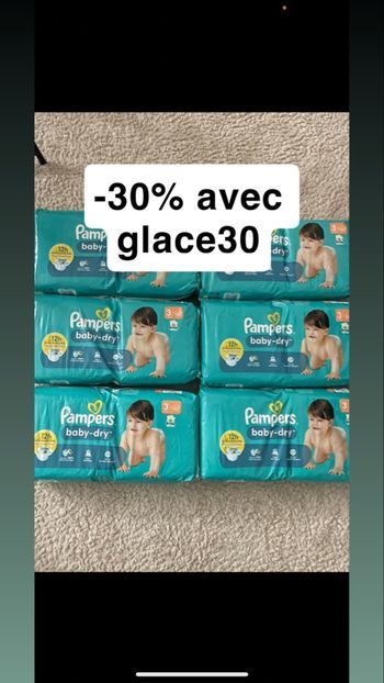 Six paquets de couches Pampers taille 4+