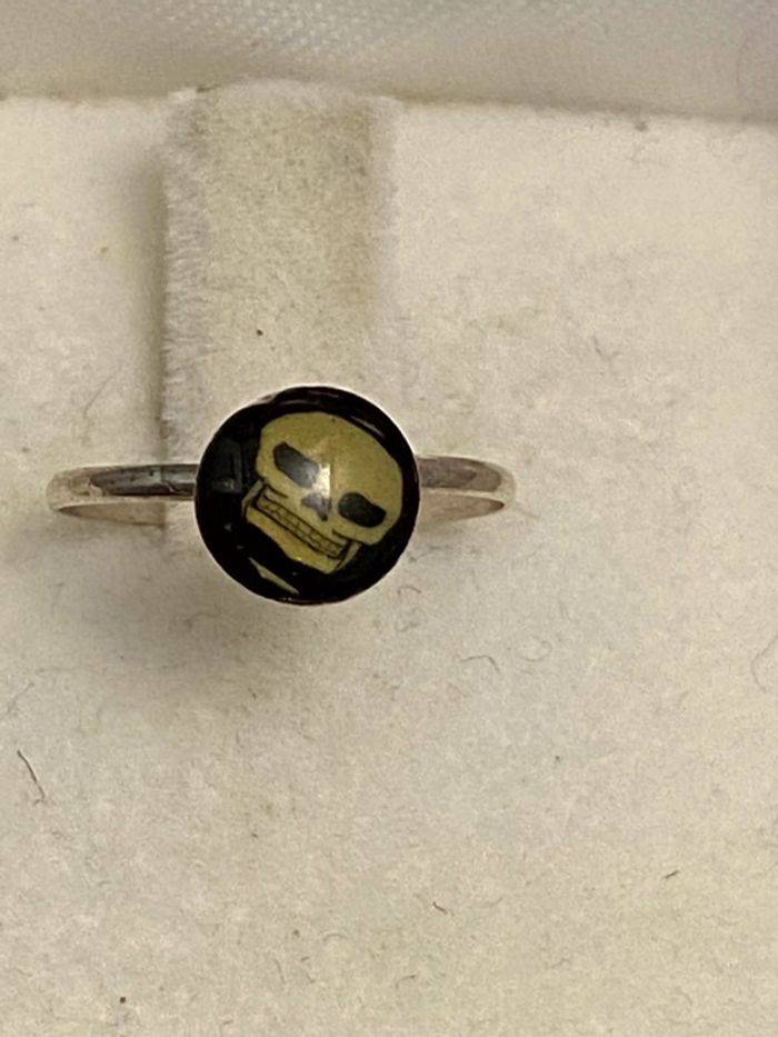 Belle bague «tête de mort » en argent massif T. 40 fille neuve
