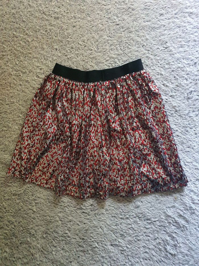 Jupe élastique et sequins taille 10 ans.