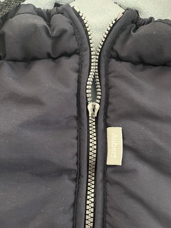 Lot composé d’un sac à langer, une chancelière et un coussin