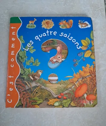 Livre cartonné les 4 saisons en TBE