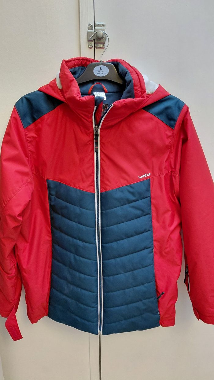 Manteau / doudoune à capuche neuve taille 14 ans