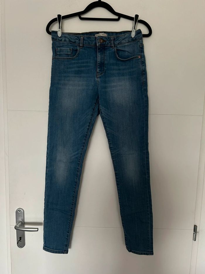 Jean bleu resserrable