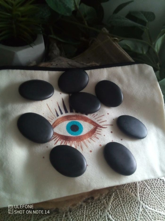 Lot de galets pour massages aux pierres chaudes + trousse